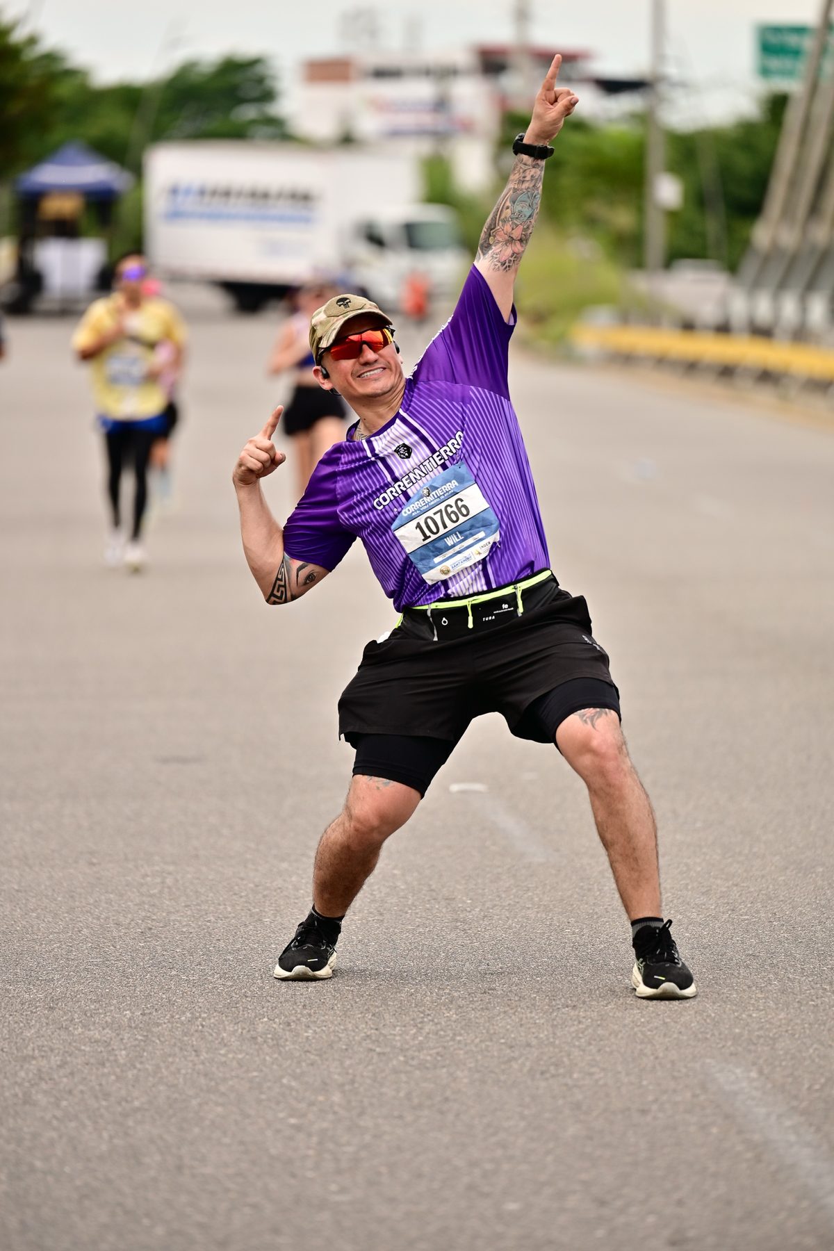 Fotografía de atletismo y running en la carrera Corremitierra — Celebración
