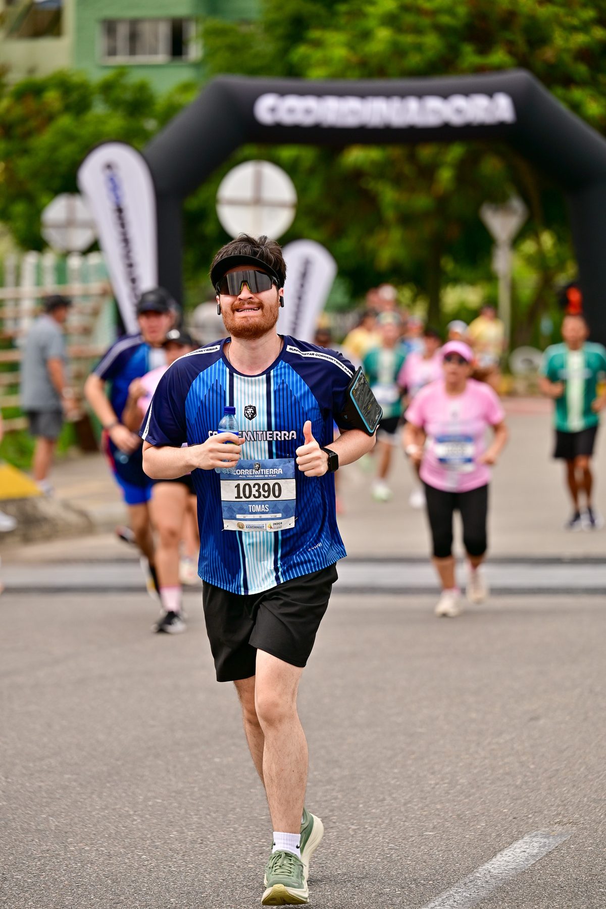 Fotografía de atletismo y running en la carrera Corremitierra — Buena energía